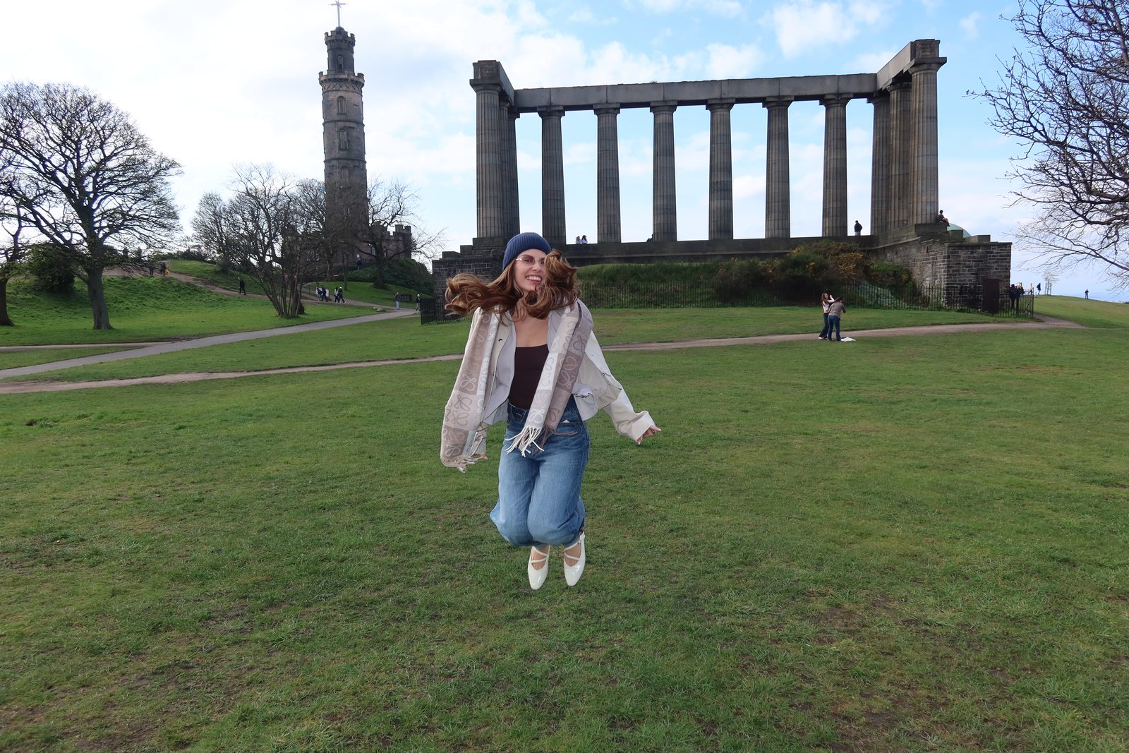 Isabella in front of ancient columns